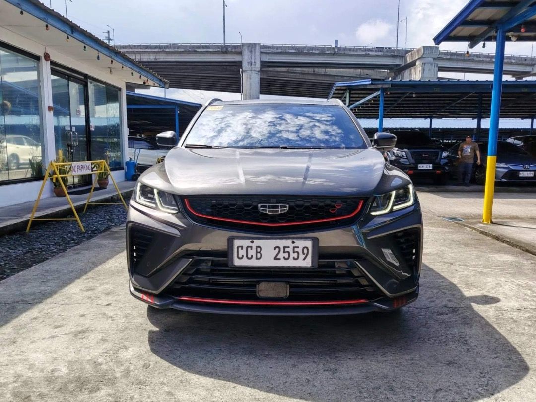 Geely Coolray Sport SE Auto (Category: Used Cars) located in Quezon City. Submitted by jayjet.jayjet (Listing ID 1469305930, Image 2). Description: 2023 GEELY COOLRAY SPORT SE Automatic Transmission 1st owned unit 29tkm only Push Start Engine Back Sensor with Camera Sunroof All Power All Original 1st Owned Unit No Issues No Accidents Mechanic Inspected Complete Tools, Jack and Spare Tire Price P568k Financing/Trade in accepted Sample Financing Co