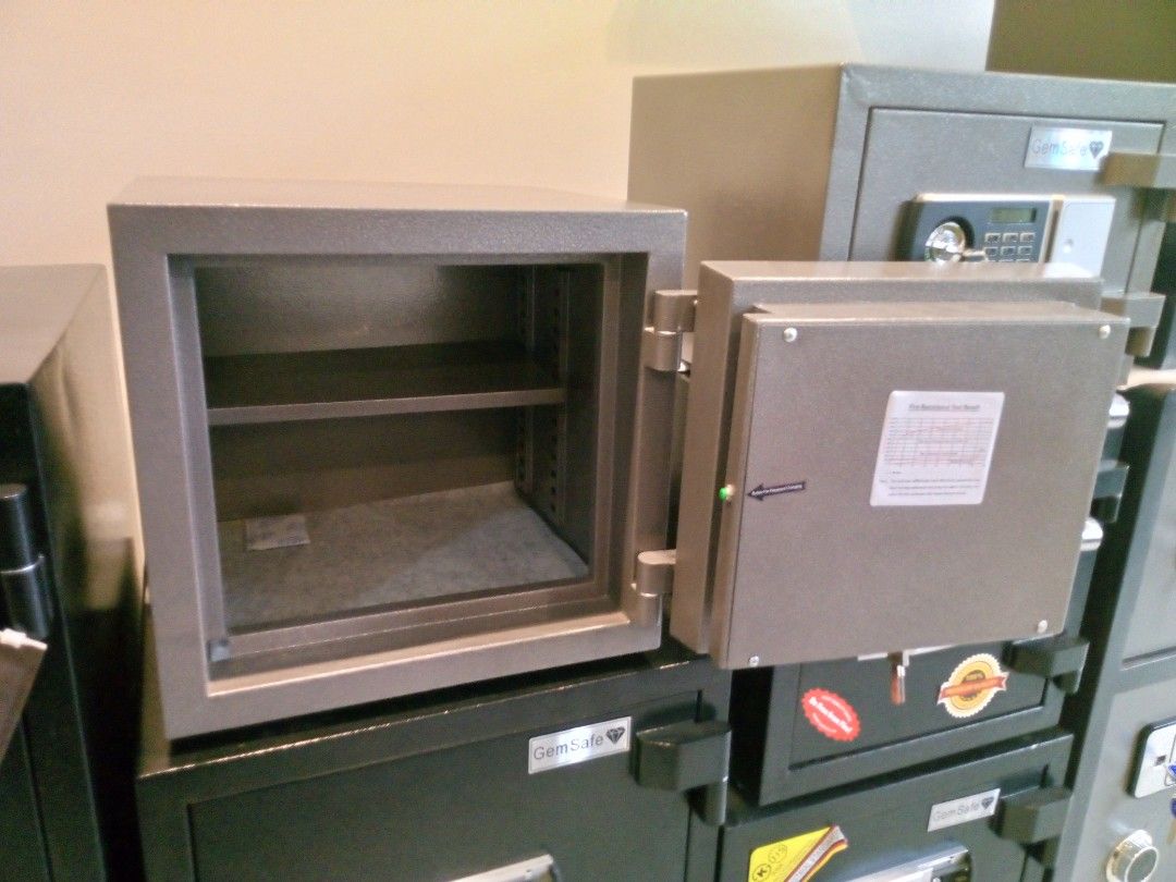 Gem Safe Digital Electronic Safe Box with Keys and Batteries (Category: Safe) located in Manila. Submitted by online_tindako (Listing ID 1469194567, Image 2). Description: - Brand: Gem Safe Digital Electronic Safe Box - Finish: Durable gray hammer-tone finish - Security: Electronic keypad with digital display and override key lock (backup keys included) - Interior: Removable shelf to organize your storage space - Build: Heavy-duty steel construct