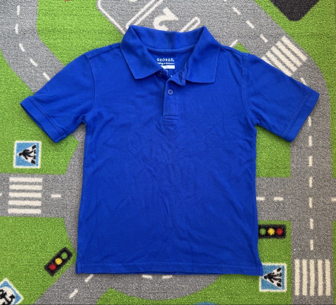 George Polo Shirt Short Sleeve (Category: Babies & Kids Fashion) located in Rizal. Submitted by preloovved (Listing ID 1469215481, Image 1). Description: Bright royal blue George polo shirt in soft cotton knit. Features short sleeves, a classic collar, and a two-button placket. Clean and ready to wear for school or casual days out. Preloved, 6-7yo, like new, ganda ng color Meet-up only in GB1 San Mateo, Rizal Shipping fee c/o buyer. Tres Marias o