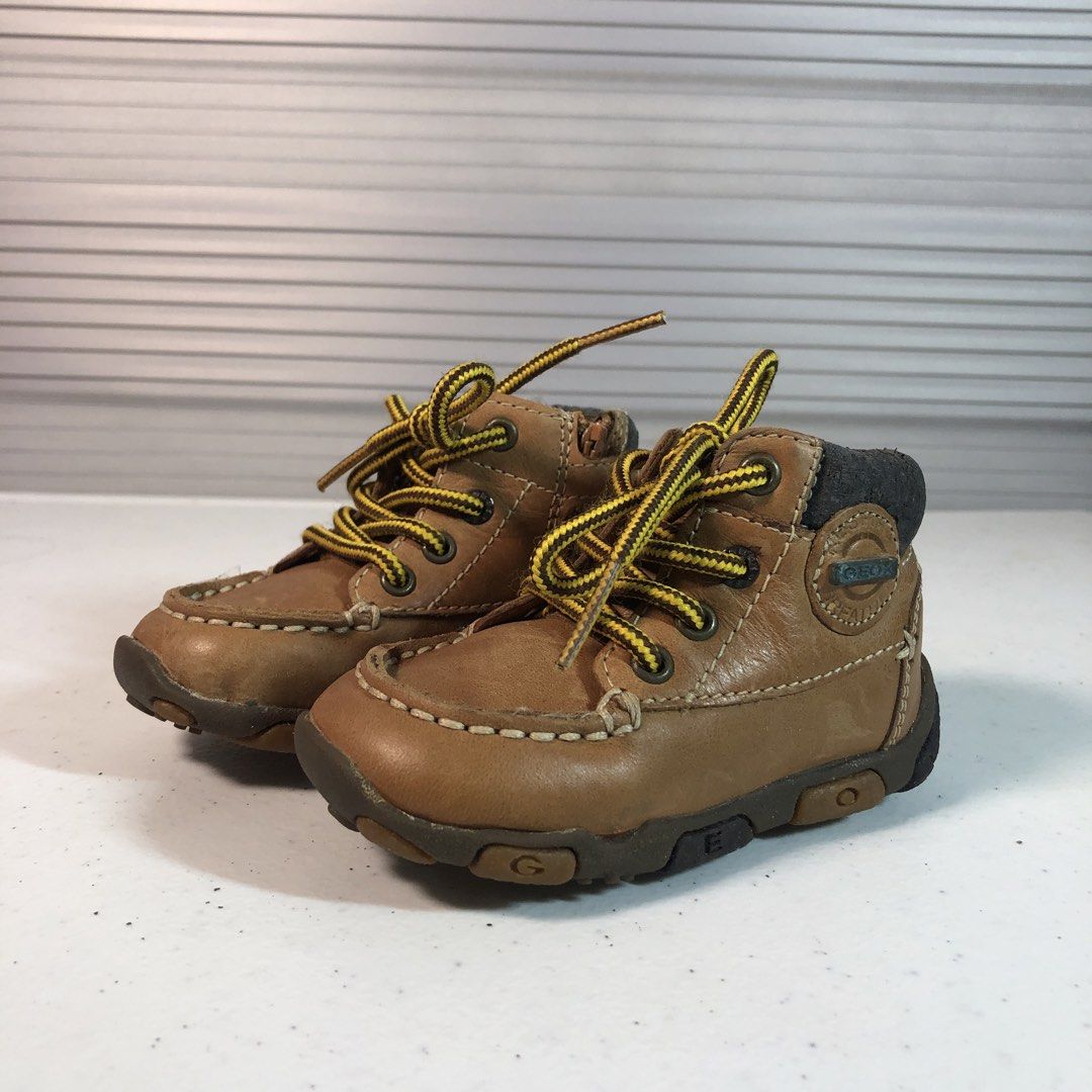 Geox Brown Leather Toddler Boots (Category: Boots) located in Manila. Submitted by all.dressed.up (Listing ID 1469170679, Image 1). Description: Brand: Geox toddler boots Material & Design: Brown leather with stylish yellow patterned laces Convenience: Side zipper for easy on and off - Condition: Dark padded ankle collar shows some cracking and flaking due to storage Strictly no return, no exchange WYSIWYG *Manage and limit your expectations when
