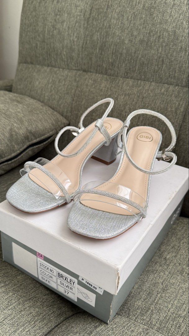 Gibi Silver Heels Size 37 (Category: Heels) located in Makati City. Submitted by angel.ad (Listing ID 1469162463, Image 1). Description: Gibi size 37 Silver formal shoes Block heel Adjustable strap Used once Good condition, like new.