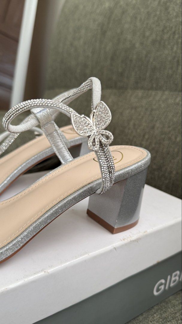 Gibi Silver Heels Size 37 (Category: Heels) located in Makati City. Submitted by angel.ad (Listing ID 1469162463, Image 3). Description: Gibi size 37 Silver formal shoes Block heel Adjustable strap Used once Good condition, like new.