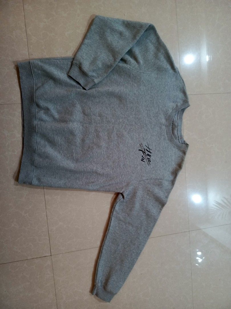 Ginger Grey Graphic Sweatshirt Size L (Category: Coats, Jackets and Outerwear) located in Cabatuan. Submitted by penthegreat (Listing ID 1469176591, Image 3). Description: dimes: 22x26 - Brand/Model: Ginger grey sweatshirt - Size: L - Design: 'HAVE FUN' chest print with trendy angled front panel stitching - Details: Ribbed collar, cuffs, and hem for a snug fit - Material: Warm and cozy cotton blend - Condition/Use: Great casual pullover for every