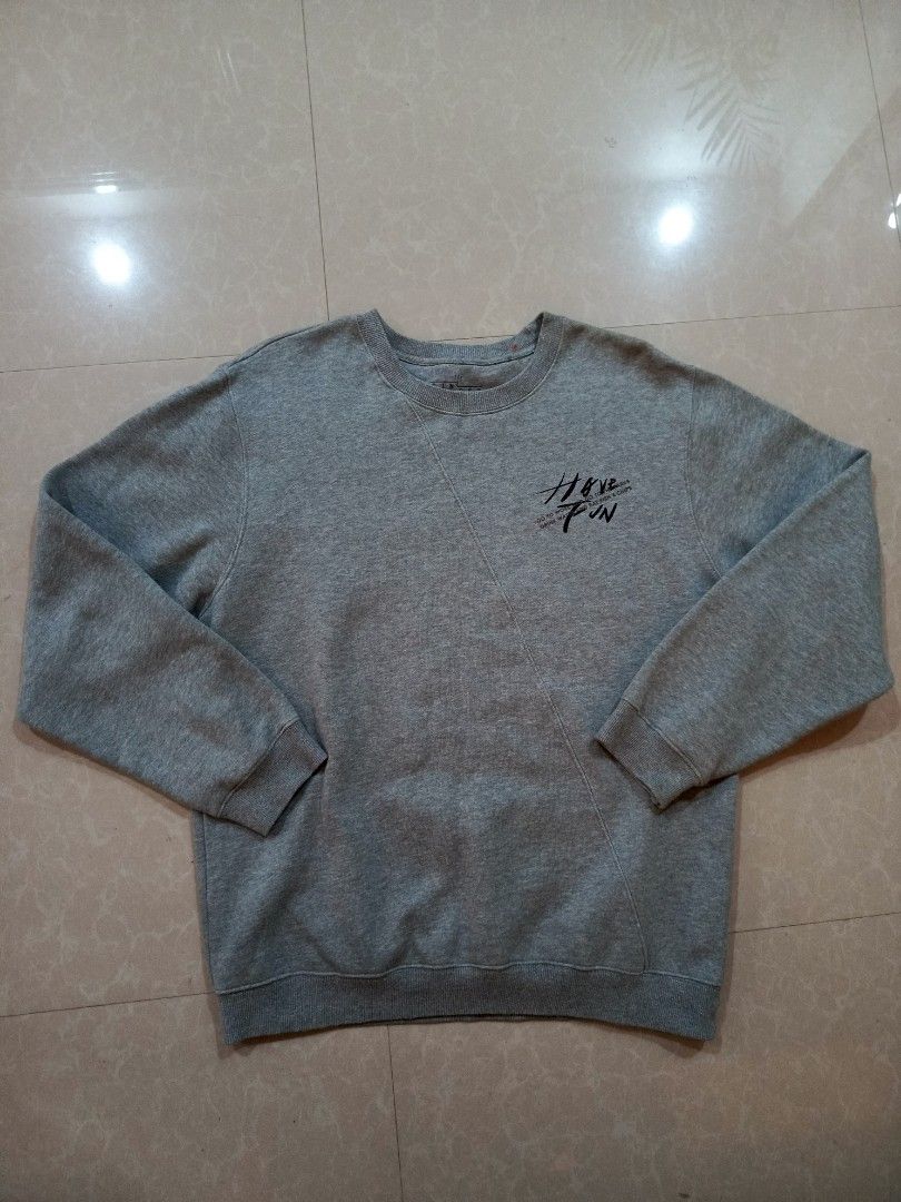 Ginger Grey Graphic Sweatshirt Size L (Category: Coats, Jackets and Outerwear) located in Cabatuan. Submitted by penthegreat (Listing ID 1469176591, Image 1). Description: dimes: 22x26 - Brand/Model: Ginger grey sweatshirt - Size: L - Design: 'HAVE FUN' chest print with trendy angled front panel stitching - Details: Ribbed collar, cuffs, and hem for a snug fit - Material: Warm and cozy cotton blend - Condition/Use: Great casual pullover for every