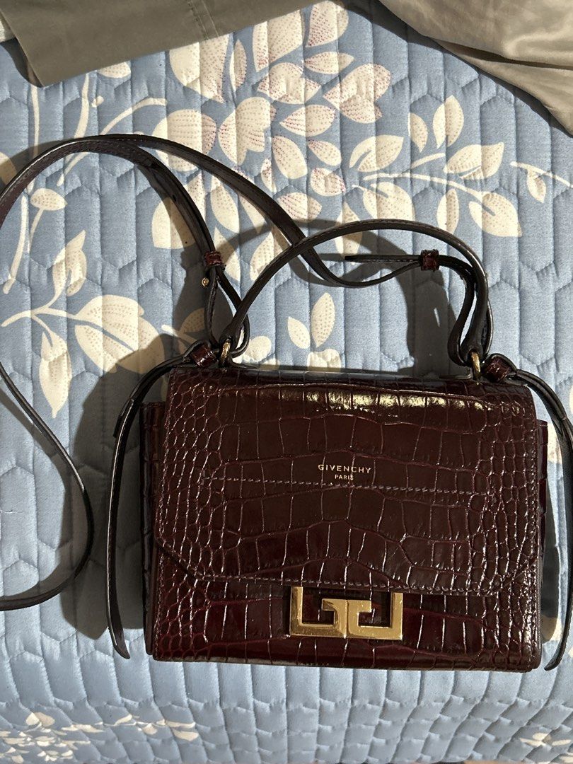 Givenchy Eden Crocodile-Embossed Leather Bag (Category: Luxury Bags & Wallets) located in Alitagtag. Submitted by patrickvillanueva (Listing ID 1469207176, Image 2). Description: Givenchy Eden Crocodile-Embossed Leather Bag - Brand: Givenchy Paris - Style: Crossbody bag / Structured flap design - Material: Rich burgundy crocodile embossed leather with glossy finish - Hardware: Signature gold-tone lock closure - Strap: Matching adjustable leather 