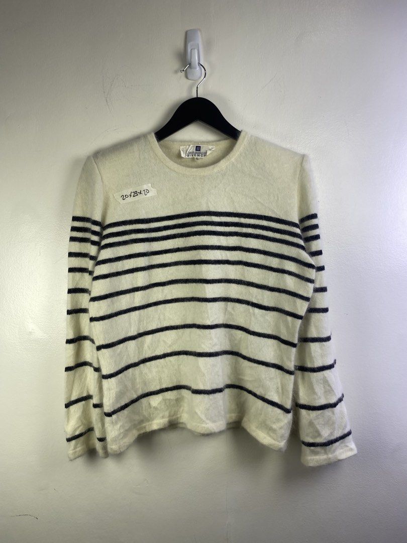 Givenchy Striped Knit Sweater with Logo Buttons (Category: Longsleeves) located in Manila. Submitted by declutterpromax (Listing ID 1469201973, Image 1). Description: - Brand: Givenchy - Color: White with black stripes - Details: Glossy black buttons with gold geometric logo accents - Material: Soft knit fabric - Design: Long sleeve, clean minimalist styling - Condition: Excellent pre-loved condition - Location: Metro Manila, Philippines - Shippi