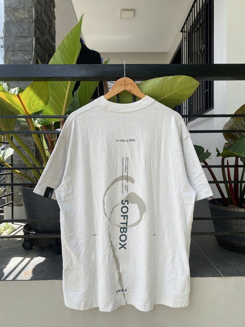 GOOPIMADE "The Future" Softbox Graphic Tee White (Category: Tshirts & Polo Shirts ) located in Roxas City. Submitted by dua-garments23 (Listing ID 1469206837, Image 3). Description: - Brand: GOOPIMADE (Softbox Series) - Color: White - Material: 100% thick, premium cotton - Fit: Relaxed boxy fit with a thick ribbed collar - Design: 'The Future' text on front; large abstract graphic and Japanese text printed down the back spine - Details: Interior 