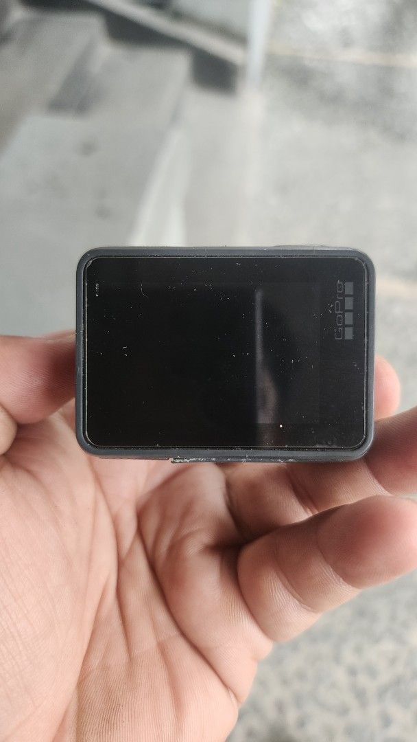 GoPro Hero 5 Black Action Camera (Category: Cameras) located in Manila. Submitted by karlmark132527 (Listing ID 1469165145, Image 2). Description: - Item: GoPro Hero 5 Action Camera - Condition: Used with noticeable scuffs and wear; lens and screens are intact and clean - Functionality: Tested and powers on successfully - Features: USB-C and HDMI ports with side door panel attached - Ideal for: Biking, surfing, travel vlogs, and rugged outdoor sh