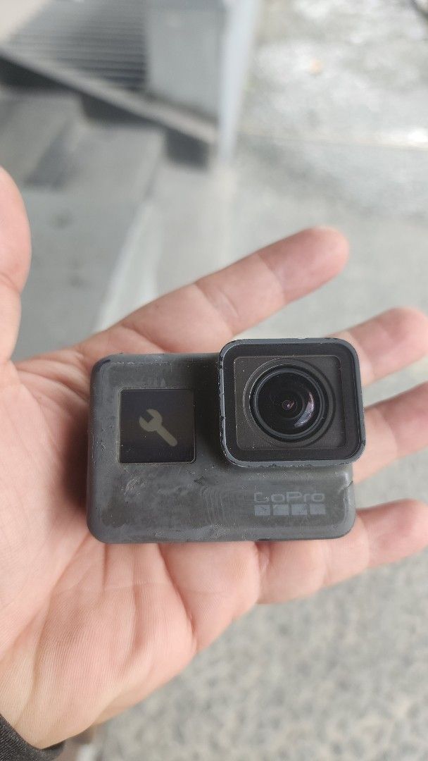 GoPro Hero 5 Black Action Camera (Category: Cameras) located in Manila. Submitted by karlmark132527 (Listing ID 1469165145, Image 1). Description: - Item: GoPro Hero 5 Action Camera - Condition: Used with noticeable scuffs and wear; lens and screens are intact and clean - Functionality: Tested and powers on successfully - Features: USB-C and HDMI ports with side door panel attached - Ideal for: Biking, surfing, travel vlogs, and rugged outdoor sh