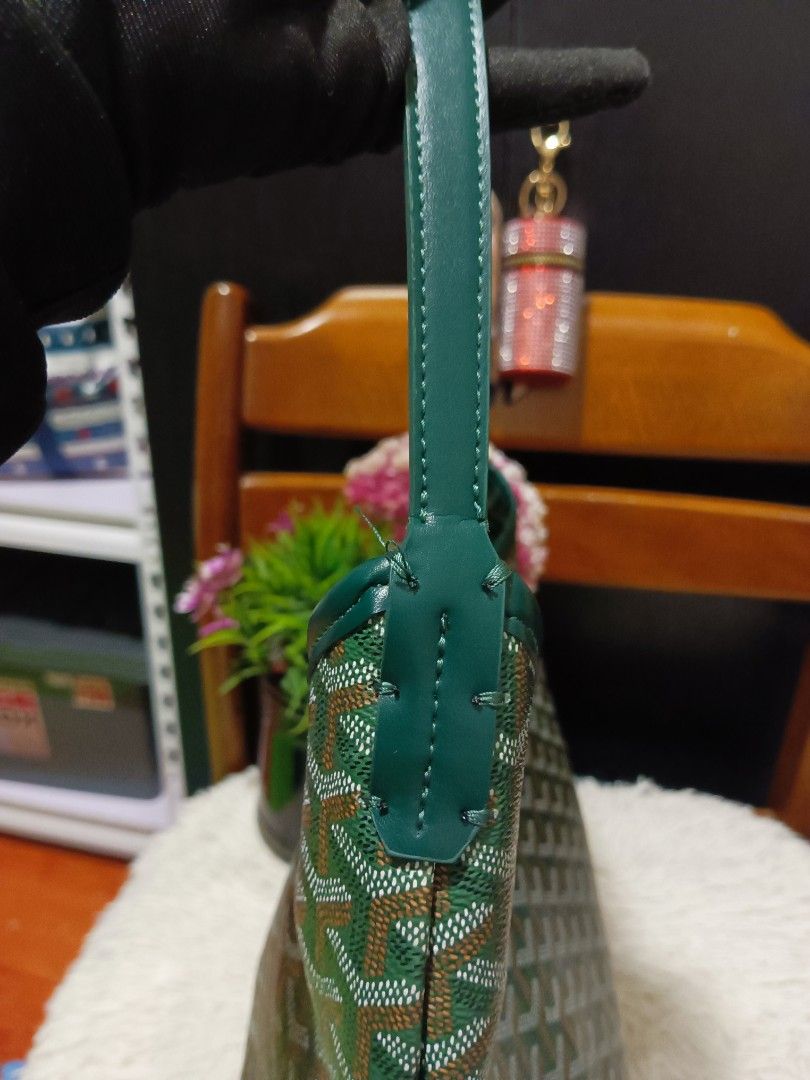 Goyard Green Hobo Shoulder Bag (Category: Luxury Bags & Wallets) located in Digos. Submitted by chihanu (Listing ID 1469204640, Image 2). Description: - c Green Goyard shoulder bag with iconic chevron print - Structured hobo silhouette with a secure top zip closure - Comfortable single matching green leather strap - Clean exterior coated canvas with sturdy leather trim - Roomy interior compartment perfect for daily essentials - Condition: Excelle