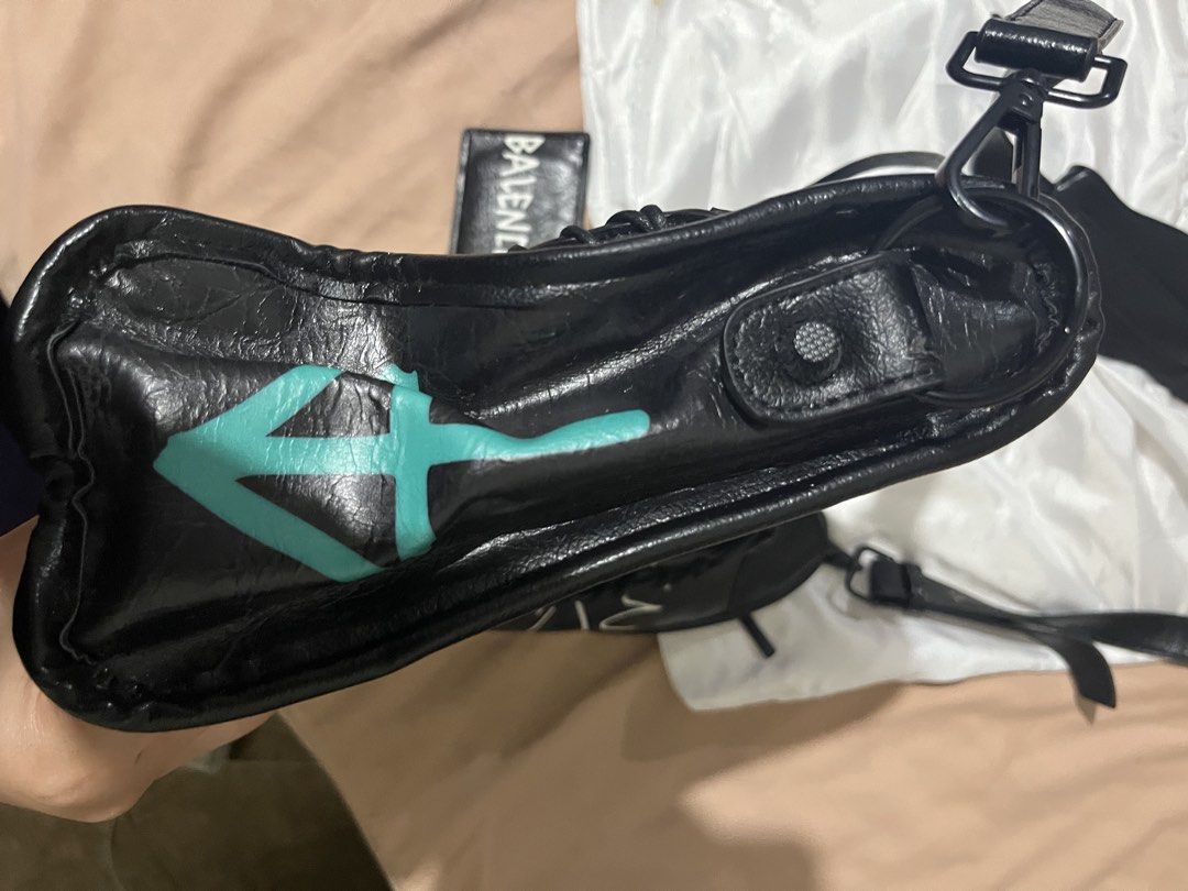 Graphic style black bag (Category: Shoulder Bags) located in Mandaue City. Submitted by zinniaxclaire (Listing ID 1469270121, Image 3). Description: Inspired only Please check picture for condition Stored in the cabinet only .