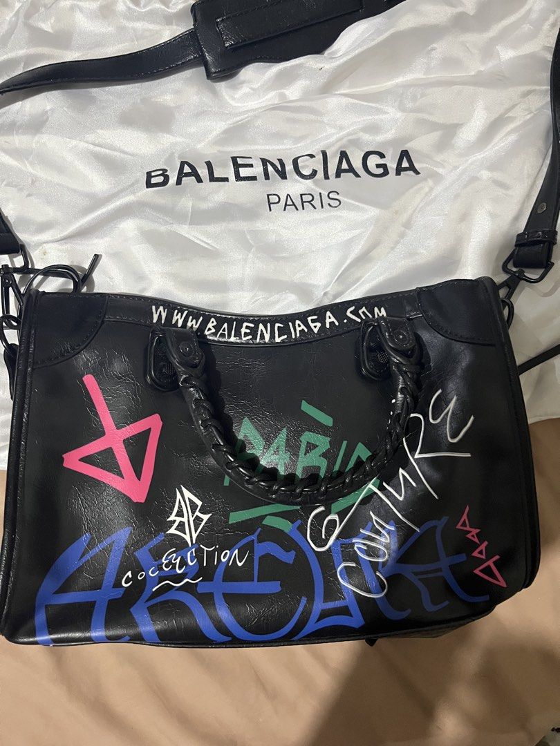Graphic style black bag (Category: Shoulder Bags) located in Mandaue City. Submitted by zinniaxclaire (Listing ID 1469270121, Image 2). Description: Inspired only Please check picture for condition Stored in the cabinet only .
