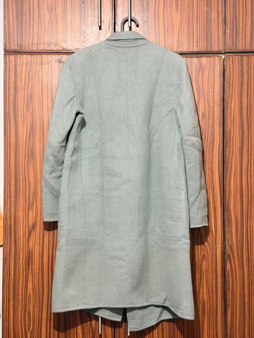 Gray Wool Long Coat (Category: Coats, Jackets and Outerwear) located in Makati City. Submitted by dabanana_ (Listing ID 1469255257, Image 2). Description: Selling for a friend! Women’s long coat - Color: Muted greenish grey - Size: Tagged Size 1 - Fits up to L -Washed and ready to wear RFS: bought online (ig shop).