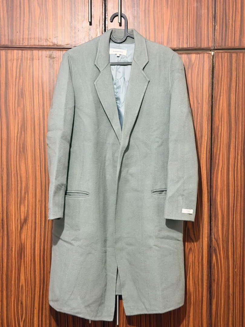 Gray Wool Long Coat (Category: Coats, Jackets and Outerwear) located in Makati City. Submitted by dabanana_ (Listing ID 1469255257, Image 3). Description: Selling for a friend! Women’s long coat - Color: Muted greenish grey - Size: Tagged Size 1 - Fits up to L -Washed and ready to wear RFS: bought online (ig shop).