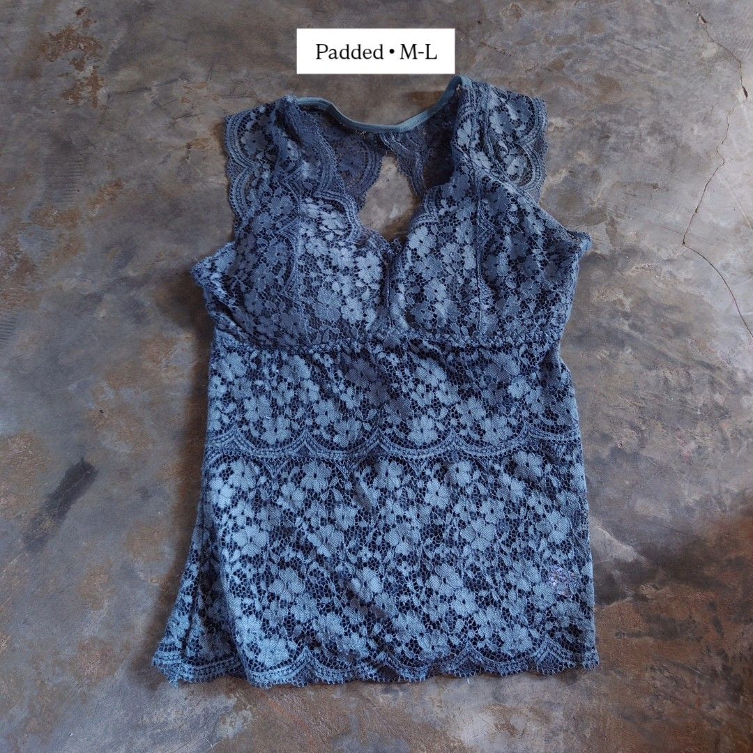 Green Lace Padded Tank Top M-L (Category: Sleeveless) located in Diffun. Submitted by declutteredbyJill (Listing ID 1469237130, Image 1). Description: - Size: M to L - Color/Pattern: Blue with all-over floral lace - Features: Built-in padding, chic back cutout detail - Fabric: Soft and comfortable - Condition: From a smoke-free home - Styling: Great for layering or wearing solo in warm weather.