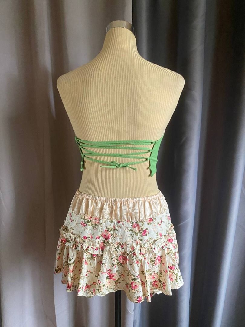 Beginning Boutique Green Strapless Lace-Up Corset Top (Category: Sleeveless) located in Cagayan de Oro. Submitted by curated_closetph (Listing ID 1469297617, Image 3). Description: — Size: XS — Color: Green — Structured cotton-blend twill fabric — Strapless sweetheart neck — Lace-up string tie back — Pointed asymmetrical hem — Boning structure details — Can negotiate the price — 🛒 Shop more to get more discounts and freebies!.