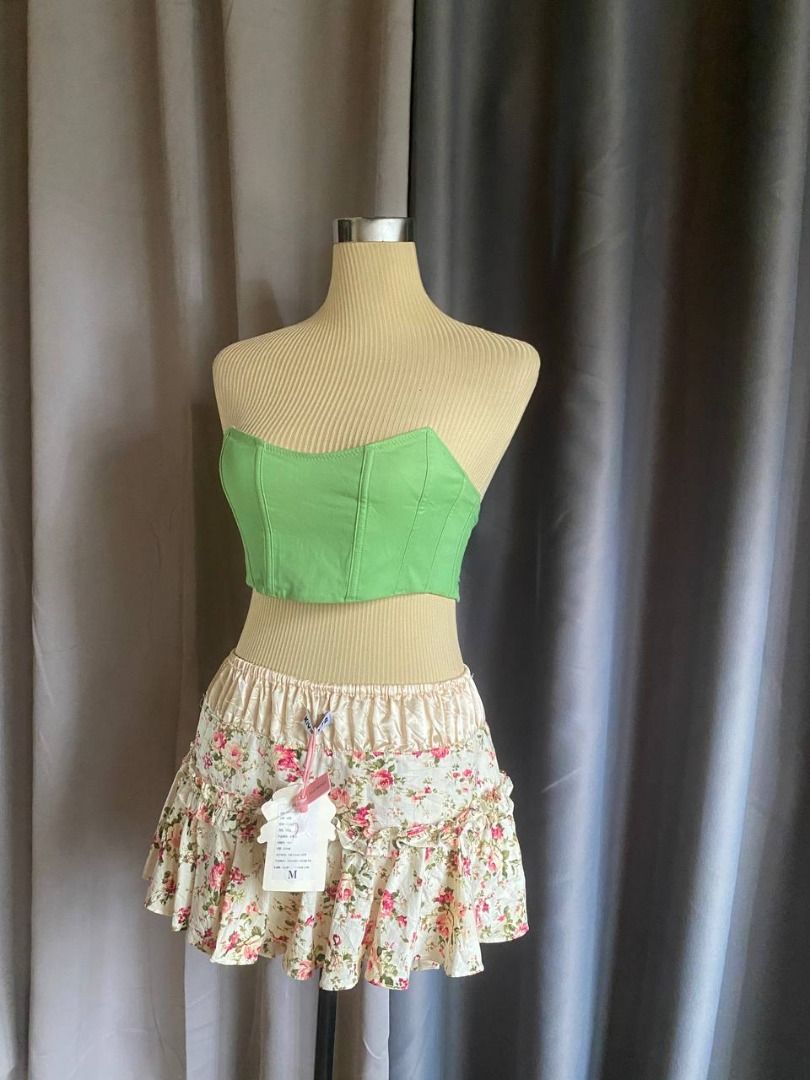 Beginning Boutique Green Strapless Lace-Up Corset Top (Category: Sleeveless) located in Cagayan de Oro. Submitted by curated_closetph (Listing ID 1469297617, Image 2). Description: — Size: XS — Color: Green — Structured cotton-blend twill fabric — Strapless sweetheart neck — Lace-up string tie back — Pointed asymmetrical hem — Boning structure details — Can negotiate the price — 🛒 Shop more to get more discounts and freebies!.