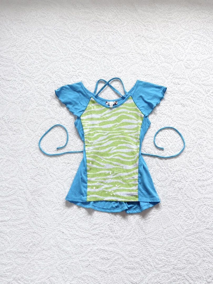 Green White Zebra Sequin Blue Top (Category: Blouses) located in Butuan. Submitted by saloreia (Listing ID 1469291100, Image 1). Description: ── ⟡ ˙💌 ̟ y2k blue zebra top w/ side ties ‧₊˚ ⋅ playful zebra print with a lace-up silhouette ‧₊˚ ⋅ ┆ ⤿ brand : Speechless ┆ ⤿ size : xs-s 🪷 condition .ᐟ: 10/10 🪷 seller’s fave!! .