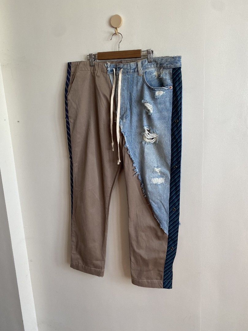 Greg Lauren Hybrid Distressed Pants (Category: Jeans) located in Abucay. Submitted by jamesnike21 (Listing ID 1469243790, Image 2). Description: 📌50/50 hybrid construction - half tan cotton chino, half vintage light-wash Levi's denim, cut on a diagonal and left with raw frayed edges 📌Details: drawstring waist with belt loops, distressed / ripped, front hand pockets, striped shirting tape down the sides with snap buttons, classic slim fit 📌exce