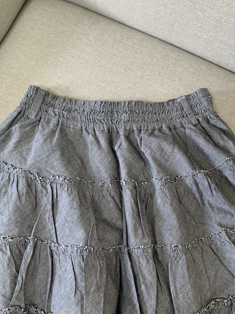 Grey Layered Tiered Ruffle Skirt (Category: Skirts) located in Paranaque City. Submitted by shoplovedbya (Listing ID 1469202156, Image 2). Description: ♡ Waist: 25-34 ♡ Length: 16 - with belt slot and inner lining - nice and flowy fabric.