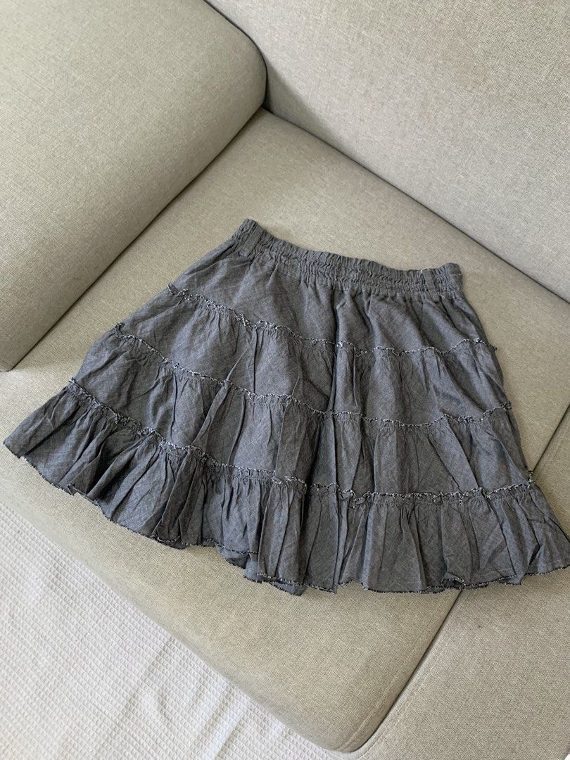 Grey Layered Tiered Ruffle Skirt (Category: Skirts) located in Paranaque City. Submitted by shoplovedbya (Listing ID 1469202156, Image 1). Description: ♡ Waist: 25-34 ♡ Length: 16 - with belt slot and inner lining - nice and flowy fabric.