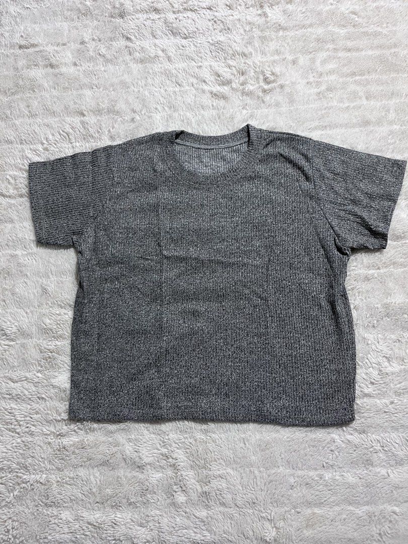 Grey Ribbed Short Sleeve T-Shirt (Category: Shirts) located in Manila. Submitted by kiks_secret_room (Listing ID 1469265724, Image 1). Description: - Color: Grey - Style: Casual everyday short sleeve tee with crew neckline - Material: Super comfortable textured ribbed knit - Length: ~21 inches - Chest Width: ~19 inches - Sleeve Length: ~8 inches.