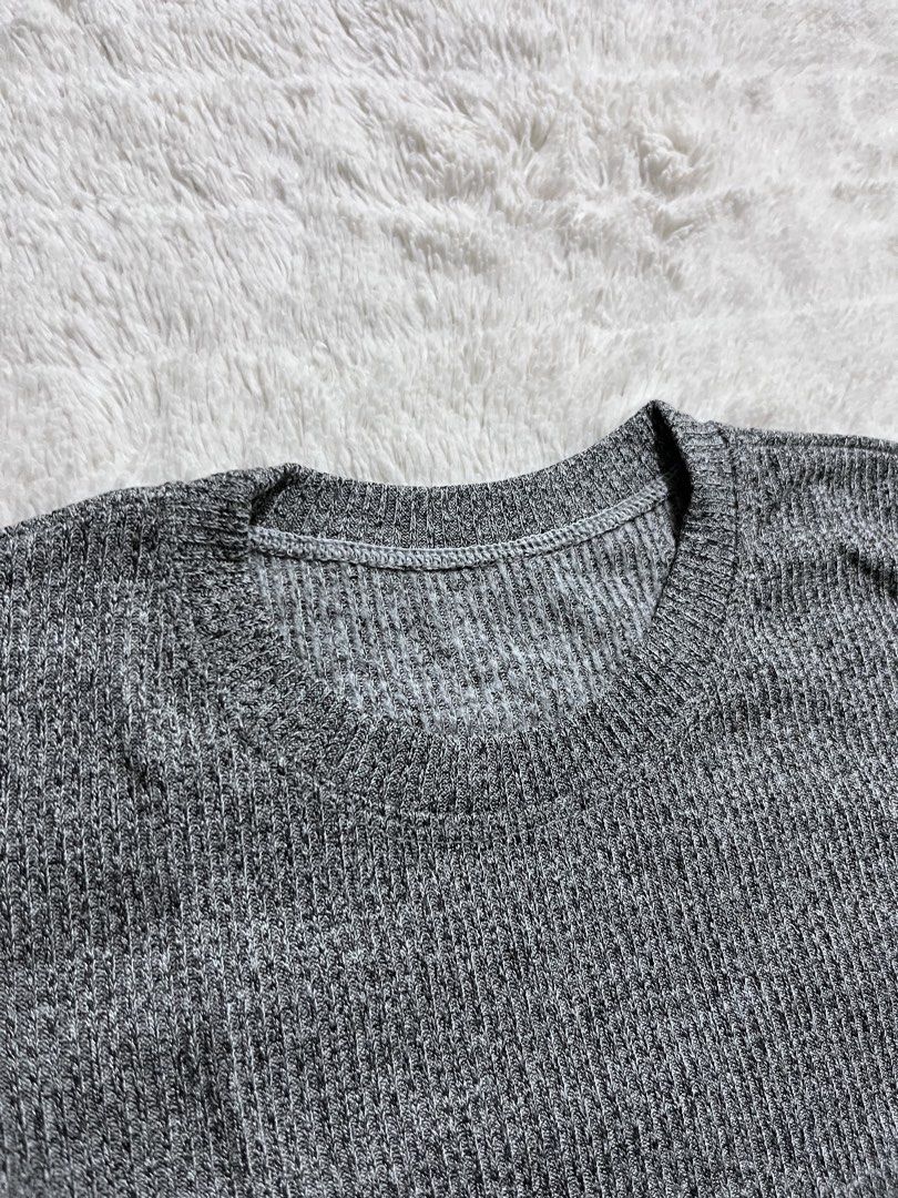 Grey Ribbed Short Sleeve T-Shirt (Category: Shirts) located in Manila. Submitted by kiks_secret_room (Listing ID 1469265724, Image 2). Description: - Color: Grey - Style: Casual everyday short sleeve tee with crew neckline - Material: Super comfortable textured ribbed knit - Length: ~21 inches - Chest Width: ~19 inches - Sleeve Length: ~8 inches.