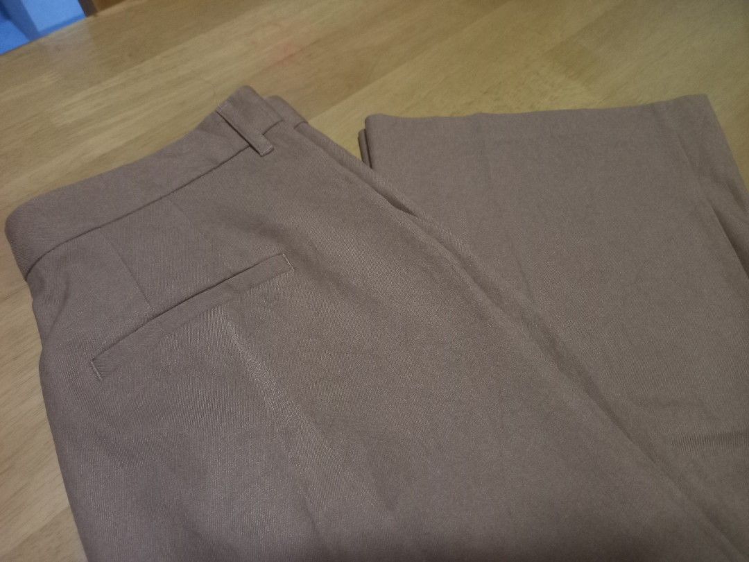 GU Brown Casual Trousers Size L (Category: Other Bottoms) located in Manila. Submitted by riaring88 (Listing ID 1469187670, Image 3). Description: best fit: W29-31 - Brand: GU - Size: L (Tag attached) - Color: Brown - Material: 100% polyester - Design: Classic waistband with belt loops, clean stitching, and simple straight-cut legs - Condition: Brand new with tags - Versatile: Great for office wear or casual outings.