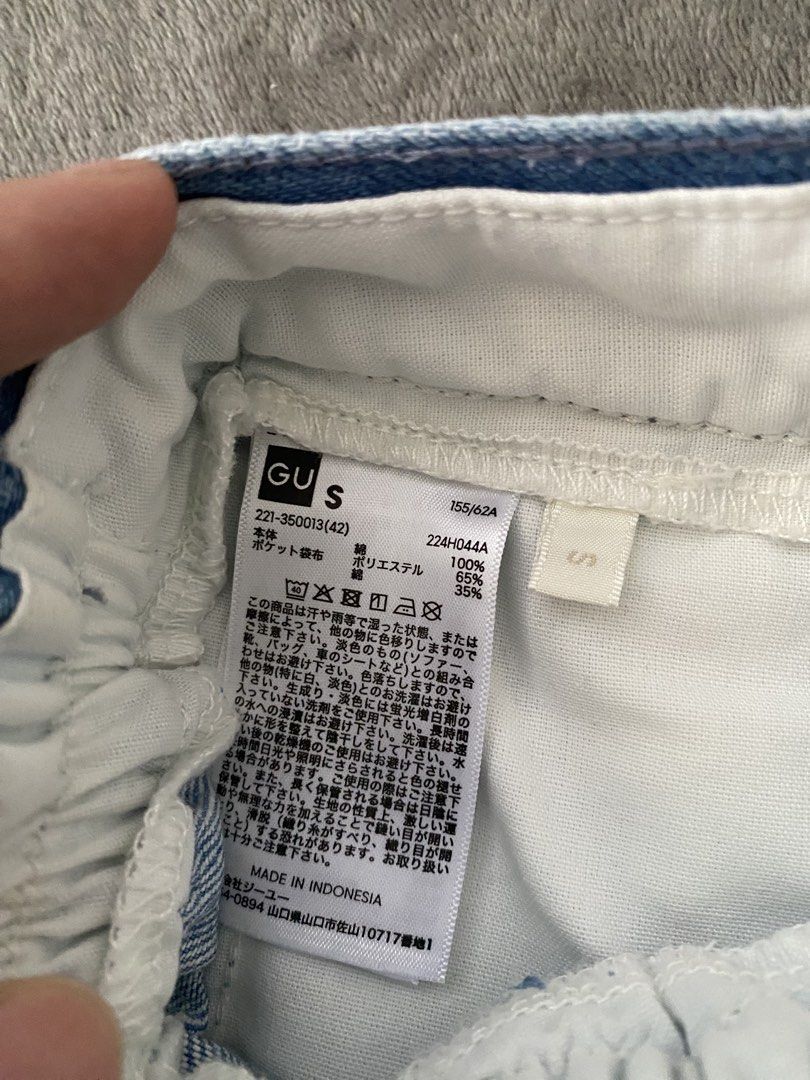 GU Denim Skort Size S (Category: Skirts) located in Manila. Submitted by love_mami (Listing ID 1469170142, Image 2). Description: - Brand: GU - Item: Denim Skort - Color: Light blue wash - Size: S - Material: Cotton blend - Details: Asymmetrical front flap with silver-toned metal snap buttons, built-in comfortable shorts - Condition: Brand new with tag - Message us for exact measurements!.