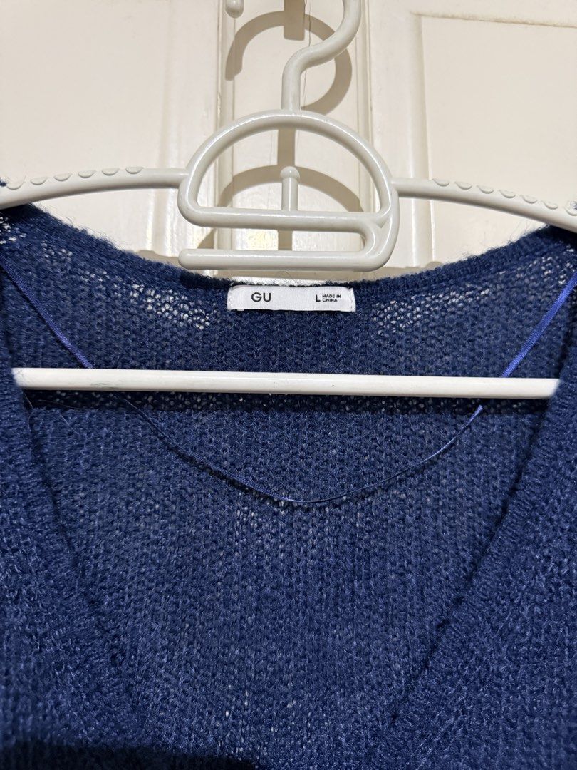 GU Navy Blue Cardigan (Category: Coats, Jackets and Outerwear) located in Marikina City. Submitted by louvy.r (Listing ID 1469378757, Image 2). Description: Fits medium body frame.