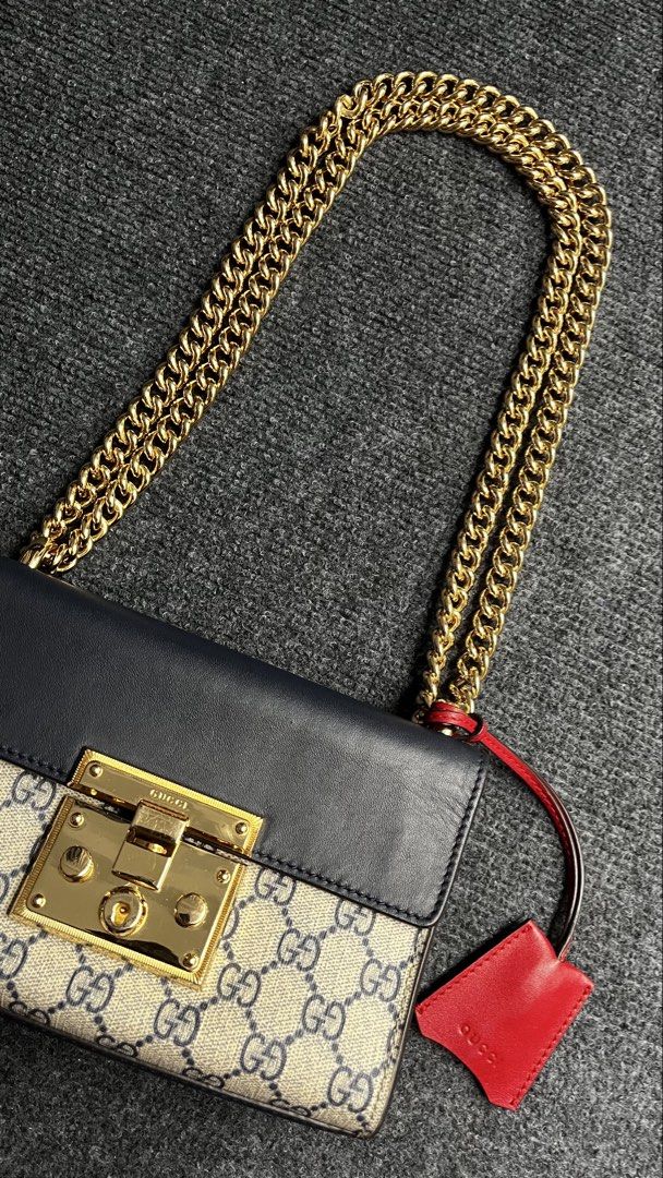 Gucci | GG Supreme Padlock (Category: Luxury Bags & Wallets) located in Muntinlupa City. Submitted by enchantiquebyygtrends (Listing ID 1469380398, Image 1). Description: G*CCI | GG SUPREME PADLOCK Beautiful condition, looks new! with fine hairline scratches on the gold-tone lock hardware, as shown. Chain remains shiny and well-preserved. Still gorgeous and effortlessly elegant! Location: Alabang, Muntinlupa📍 DISCLAIMER: We are not affiliated wi