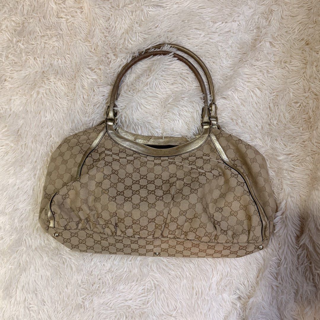 Gucci Abbey D-Ring Shoulder Bag (Category: Luxury Bags & Wallets) located in Pasay City. Submitted by erinsclosetph (Listing ID 1469277887, Image 2). Description: Gucci Abbey D-Ring Shoulder Bag Classic Gucci Abbey shoulder bag featuring the signature D-ring detail. A timeless designer piece for everyday styling. Condition: Heavily used Hardware: Tarnishing and visible signs of wear Canvas and trim: Stains on the corners Additional photo availabl