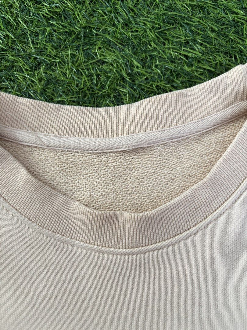 Gucci Beige Logo Sweatshirt (Category: Coats, Jackets and Outerwear) located in Makati City. Submitted by rare_thrift_stuff (Listing ID 1469164737, Image 3). Description: - Authentic Gucci Sweatshirt - Color: Beige - Material: 100% Cotton - Made in Italy - Features iconic green and red striped ribbon with interlocking G embroidery - Ribbed collar, cuffs, and hem for a snug fit - Style code: 409708-XJ064 - Clean interior with original standard car