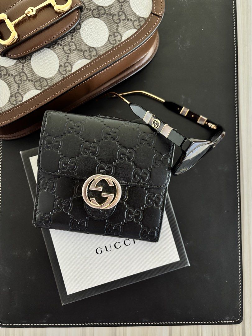 Gucci GG Interlocking Wallet (Category: Luxury Bags & Wallets) located in Muntinlupa City. Submitted by closet.confessions (Listing ID 1469272777, Image 2). Description: GUCCI GG Trifold Wallet Rank A Unisex comes Fullset; box, dustbag, care card 🎁 giftable ⭐️17.5k only!!! *vs market price: 28k up | srp: 58k .