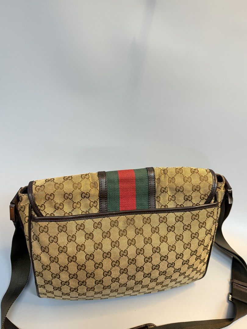 Gucci Messenger (Category: Luxury Bags & Wallets) located in Cebu City. Submitted by ricahsukaybags_2017 (Listing ID 1469228594, Image 2). Description: Gucci messenger cherry line. Med size. No flaws normal sign of used only.