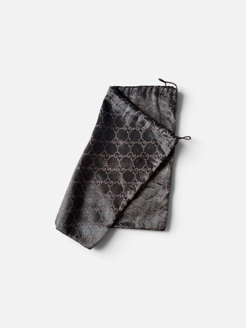 Gucci Monogram Dust Bag (Category: Announcements) located in Cebu City. Submitted by lchadpierr03463 (Listing ID 1469308710, Image 2). Description: • Material: Lustrous satin or silk-blend fabric • Pattern: Iconic interlocking GG monogram • Design: Soft pouch style with a dark drawstring top • Dimensions: Typically around 14 x 13 inches (varying slightly depending on the specific production run or bag size it accompanied Authentic .