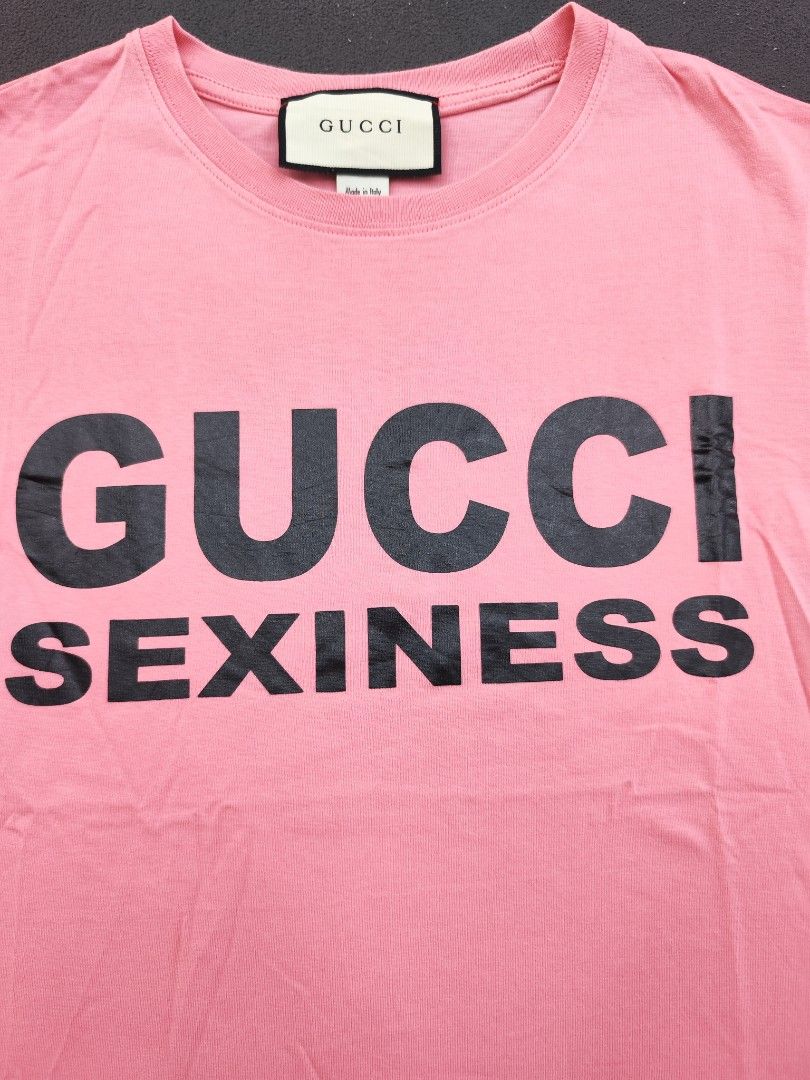 Gucci Sexiness Tee (Category: Luxury Apparel) located in Bulacan. Submitted by emilj23 (Listing ID 1469200464, Image 2). Description: Gucci Sexiness Tee Size L on tag L 25 W 18.5 Condition 9.5/10 Color rate 9.5/10 No Issue.