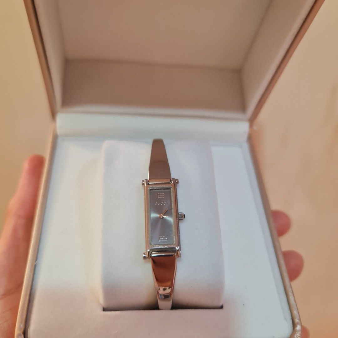 Gucci Watch in Silver Tone Gray Dial (Category: Women's Watches) located in Navotas City. Submitted by ryjayshoppe (Listing ID 1469240057, Image 1). Description: Onhand and Ready to ship Original Preloved GG Watch in Silver Tone Gray Dial Almost New Condition!🥰Makinis❤️ XS-Small size 15cm-16cm with Replacement Box only Last Price Posted!Low ballers will not entertained! Free shipping nationwide! 📌DISCLAIMER📌 We are not affiliated, associated, 