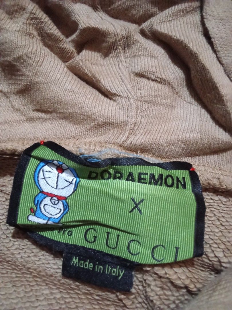 Gucci x doreamon (Category: Hoodies) located in Manila. Submitted by tcbukay_zxc25 (Listing ID 1469337147, Image 3). Description: Gucci x doreamon embroidery logo size medium excellent.