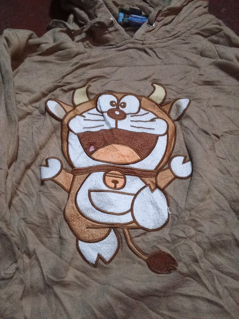 Gucci x doreamon (Category: Hoodies) located in Manila. Submitted by tcbukay_zxc25 (Listing ID 1469337147, Image 2). Description: Gucci x doreamon embroidery logo size medium excellent.