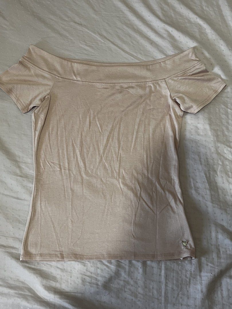 Guess Pastel Pink Off-Shoulder Top (Category: Blouses) located in Angeles City. Submitted by ferriccii (Listing ID 1469252896, Image 1). Description: A lot more pink in person Size Medium Only used it once Reason for selling: too loose on me.