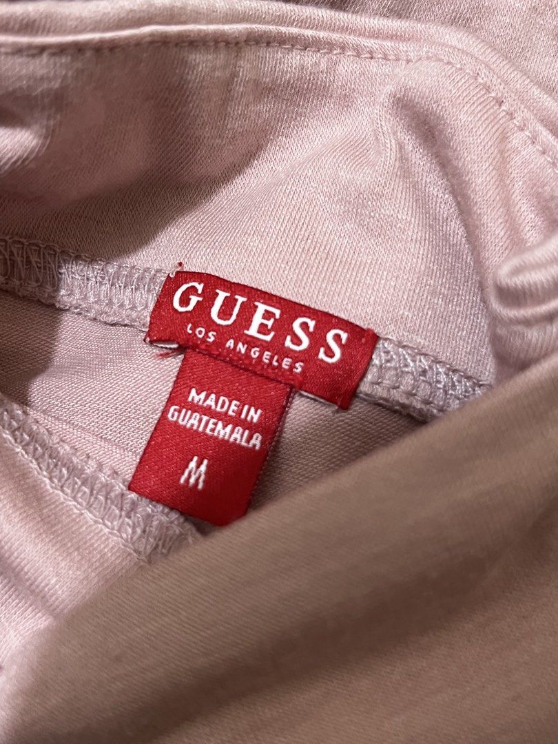 Guess Pastel Pink Off-Shoulder Top (Category: Blouses) located in Angeles City. Submitted by ferriccii (Listing ID 1469252896, Image 2). Description: A lot more pink in person Size Medium Only used it once Reason for selling: too loose on me.