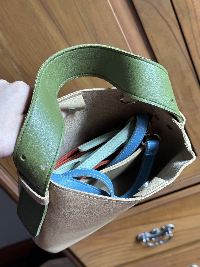 gvn micro bag (beige) (Category: Cross-body Bags) located in Makati City. Submitted by coconutbread (Listing ID 1469220755, Image 3). Description: - beige base - with interchangeable orange & green top handles - with interchangeable blue & light green straps - slight discolouration on the base (see last pic).