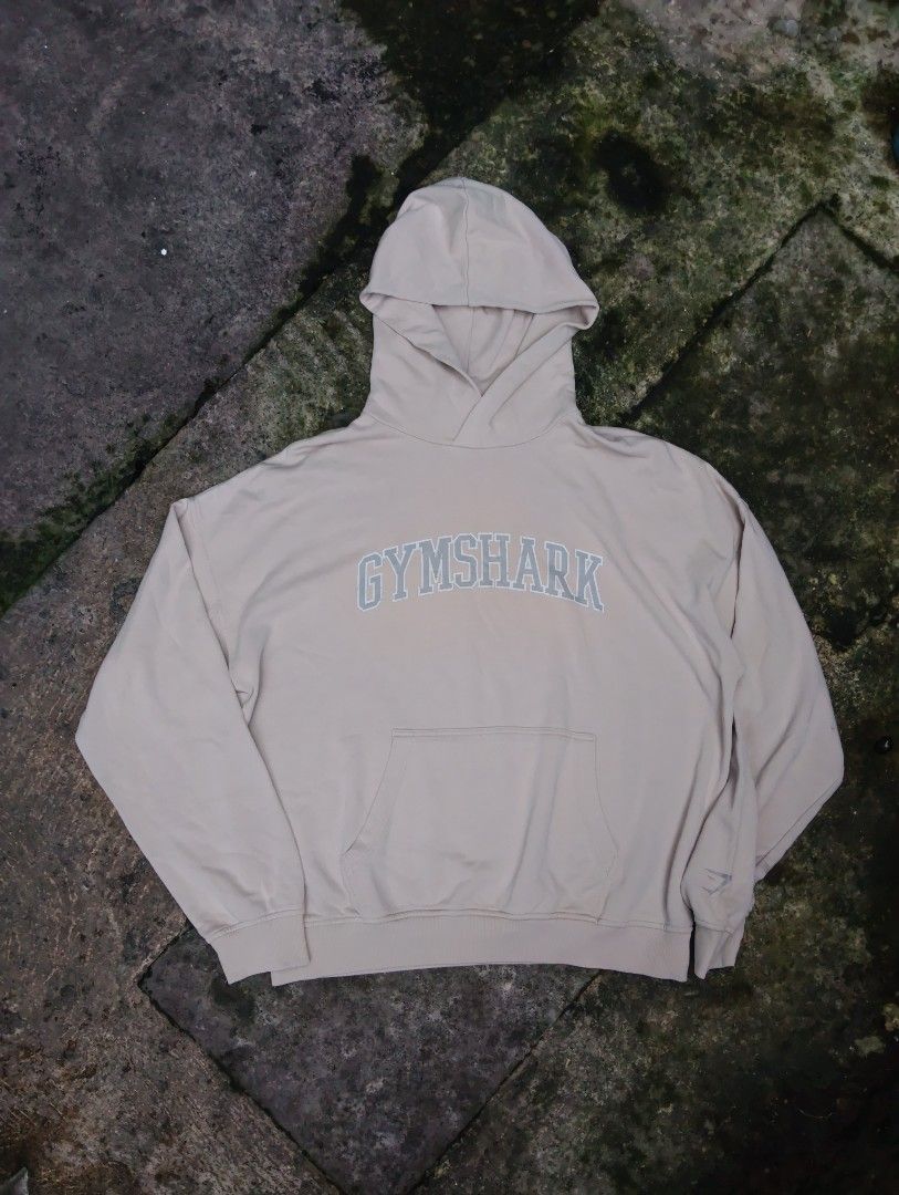 GYMSHARK COLLEGIATE PULL-OVER HOODIE (Category: Activewear) located in Talisay. Submitted by nooooooooooooooooy (Listing ID 1469173542, Image 2). Description: GYMSHARK COLLEGIATE PULL-OVER HOODIE COLOR OFFWHITE LARGE WIDTH 27 (OVERSIZE TYPE) LENGTH 31 EXCELLENT NO FLAWS, NEED WASH PM💌💌.