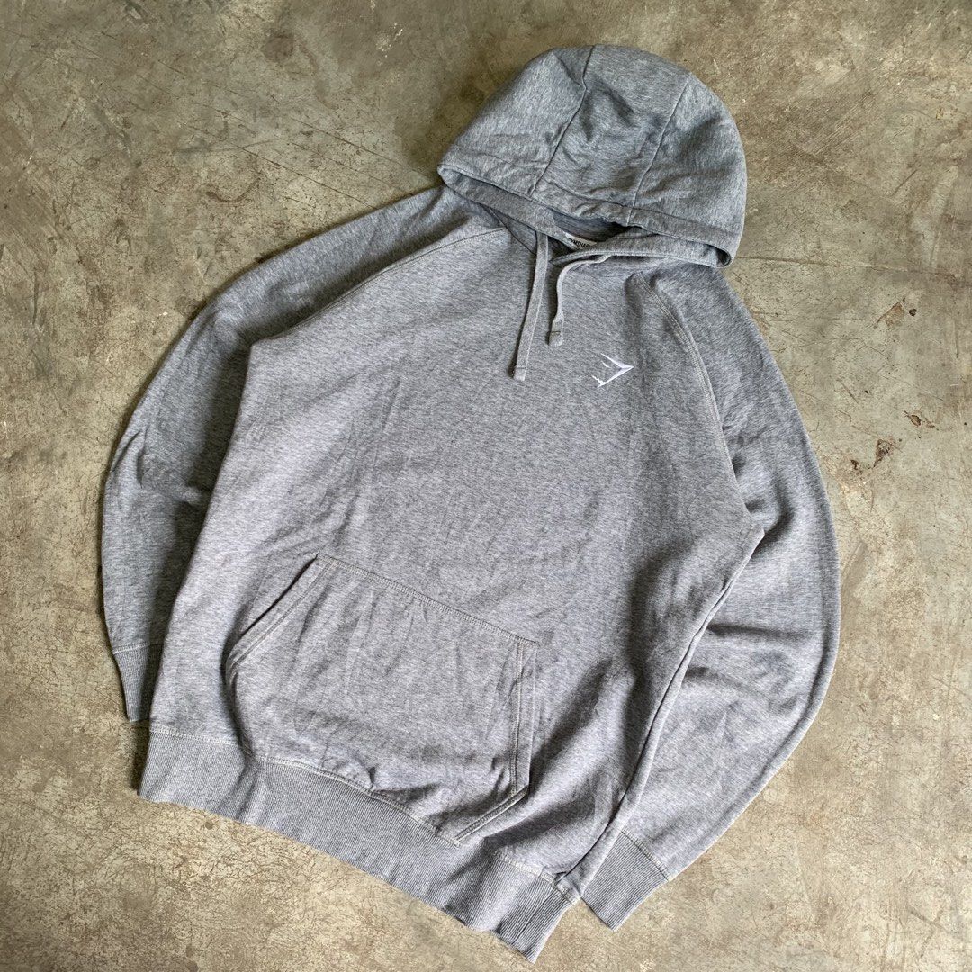 Gymshark Grey Hoodie Jacket Size L (Category: Hoodies) located in Manila. Submitted by emplysthrift. (Listing ID 1469225890, Image 2). Description: Gymshark Dark Grey Hoodie Jacket Authentic Width "23 Length "29 Excellent Condition Colorrate: 9.8/10 Flaws: cut washtag (authentic ) Unli vouch/vc for safe transactions 📲 Location: Laspinas City, Metro Manila, Brngy Talon Uno. 📍 DM IF INTERESTED📥 - Brand: Gymshark - Style: Pullover hoodie with adj
