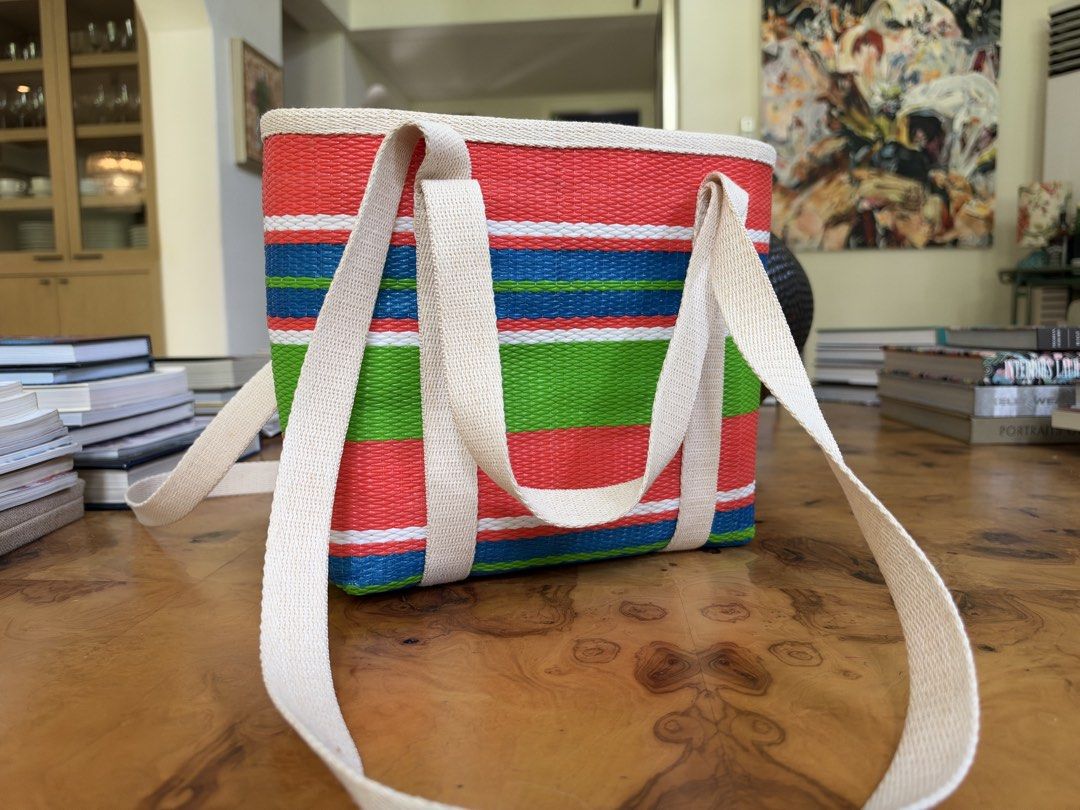 Halohalo Striped Woven Tote Bag (Category: Tote Bags) located in Muntinlupa City. Submitted by katoshops (Listing ID 1469201662, Image 2). Description: Halo-halo Tote Current Market Price: ₱5,000.00 Selling Price: ₱1,300.00 Condition: Very Good (9 /10) Reason for Selling: Don’t get to use this anymore. Additional Details: Color: Orange, blue and green Worn: Barely used Flaws: None Inclusions: Bag only Shipping c/o buyer.