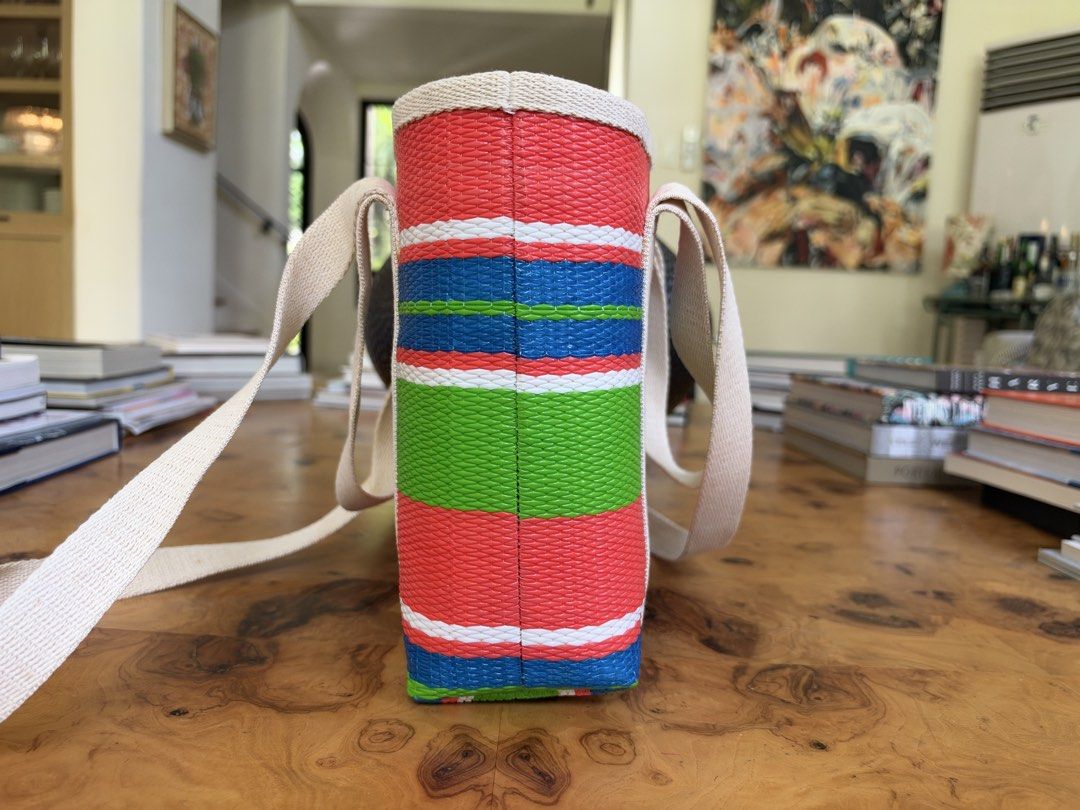 Halohalo Striped Woven Tote Bag (Category: Tote Bags) located in Muntinlupa City. Submitted by katoshops (Listing ID 1469201662, Image 3). Description: Halo-halo Tote Current Market Price: ₱5,000.00 Selling Price: ₱1,300.00 Condition: Very Good (9 /10) Reason for Selling: Don’t get to use this anymore. Additional Details: Color: Orange, blue and green Worn: Barely used Flaws: None Inclusions: Bag only Shipping c/o buyer.