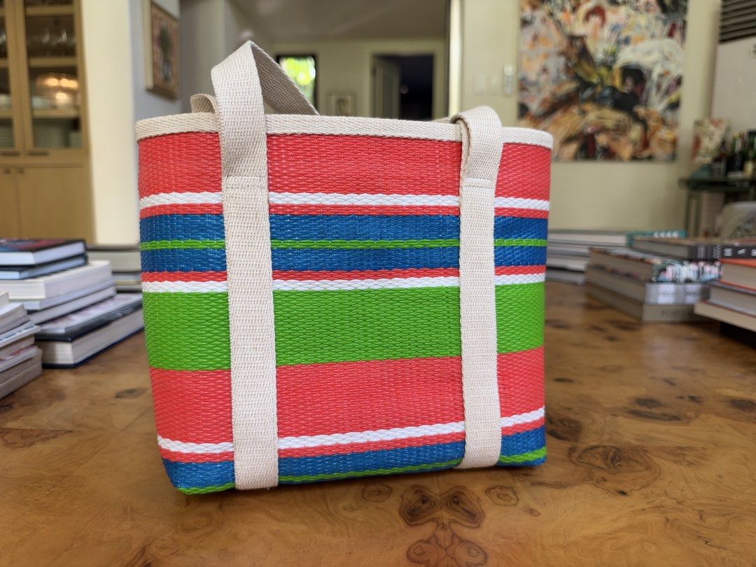 Halohalo Striped Woven Tote Bag (Category: Tote Bags) located in Muntinlupa City. Submitted by katoshops (Listing ID 1469201662, Image 1). Description: Halo-halo Tote Current Market Price: ₱5,000.00 Selling Price: ₱1,300.00 Condition: Very Good (9 /10) Reason for Selling: Don’t get to use this anymore. Additional Details: Color: Orange, blue and green Worn: Barely used Flaws: None Inclusions: Bag only Shipping c/o buyer.