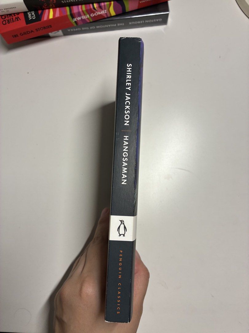 Hangsaman by Shirley Jackson (Penguin Classics) (Category: Storybooks) located in Manila. Submitted by ellacortezzz (Listing ID 1469247135, Image 3). Description: - Title: Hangsaman by Shirley Jackson - Edition: Penguin Classics paperback with striking cover illustration by Brianna Harden - Plot: A dark, psychological story following 17-year-old Natalie Waite heading off to college, inspired by a real-life 1946 disappearance - Condition: Clean pa