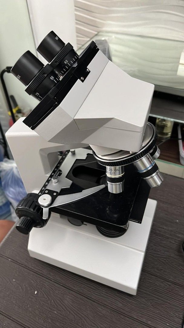 Harman Binocular Compound Microscope Laboratory Scientific (Category: Medical Supplies & Tools) located in Las Pinas. Submitted by jamiejade (Listing ID 1469239572, Image 1). Description: - Harman binocular compound microscope, ideal for labs, studies, and hobbies - Dual eyepieces with adjustable interpupillary distance for comfortable viewing - Rotating objective turret featuring multiple lenses, including an oil immersion lens - Mechanical stag